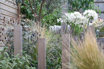 Long terraced garden in Ealing with timber sleepers